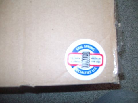 2004 Ford Crown Victoria - A sticker on a cardboard box indicates it contains coil springs manufactured in the USA.