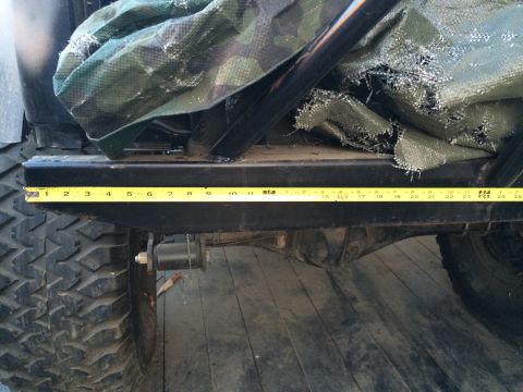 1987 Suzuki Samurai - Measuring the frame of a vehicle with a tape measure.