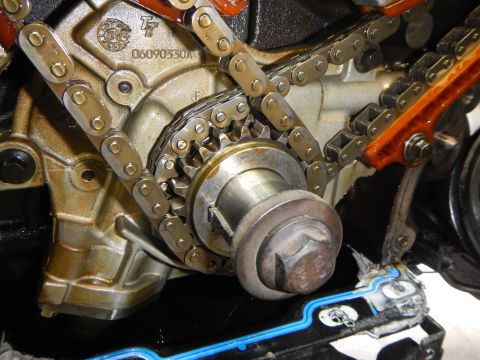 2002 Ford Mustang - Engine timing chain and gears are shown in this close-up view.