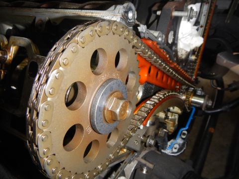 2002 Ford Mustang - Engine timing chain and gears assembly, showing the intricate mechanical components.