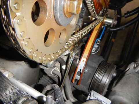 2002 Ford Mustang - Engine timing components, including a chain and sprockets, are visible in this close-up mechanical view.