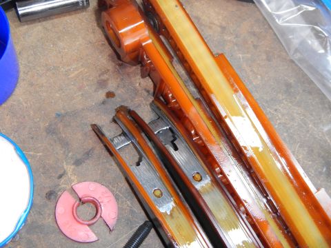 2002 Ford Mustang - Close-up of automotive timing chain components, likely during a repair or maintenance procedure.