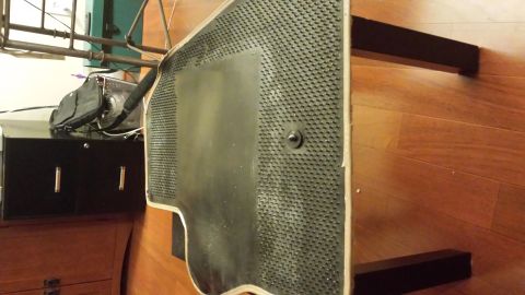 1995 Ford Bronco - A single black rubber floor mat is shown, likely from a vehicle's interior.