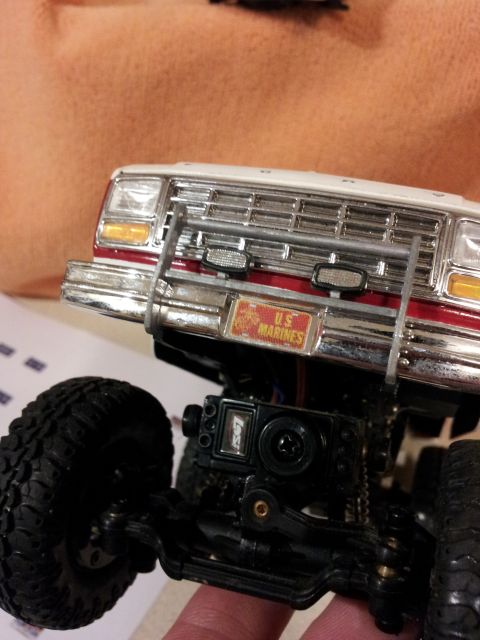 1995 Ford Bronco - This toy truck features a U.S. Marines license plate and exposed electronic components.