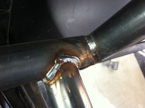 1995 Ford Bronco - Close-up view of welded metal pipes, showing the joinery and material texture.