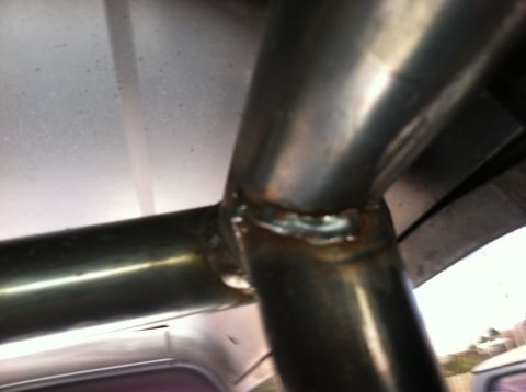 1995 Ford Bronco - Welded roll cage tubing is visible in this close-up shot.