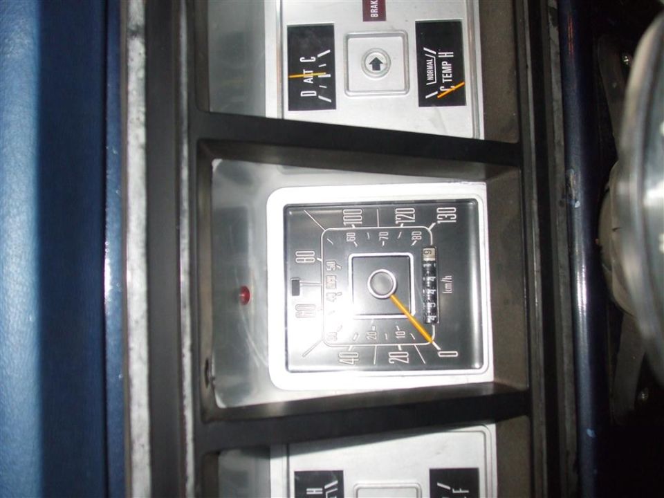 1979 Ford Bronco dashboard with speedometer, altimeter, and temperature gauges visible