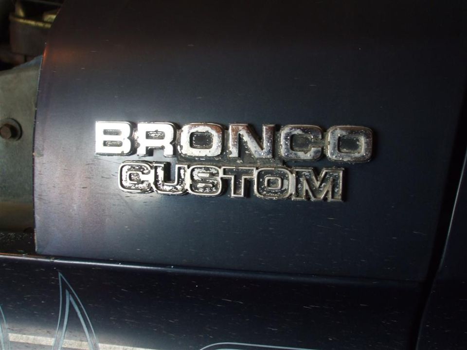 Bronco Custom badge on dark vehicle
