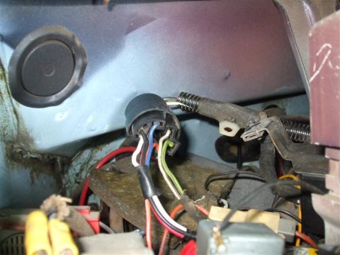 1979 Ford Bronco - This image shows a close-up view of a vehicle's electrical wiring harness and connectors.
