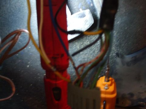 1979 Ford Bronco - Wiring harness and test light detail, likely for automotive electrical work.