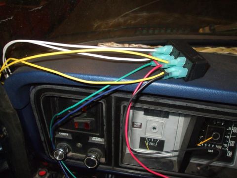 1979 Ford Bronco - Aftermarket wiring harness connected to the dashboard of a 1979 Ford Bronco.