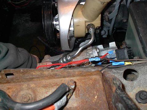 1979 Ford Bronco - Engine bay detail with focus on power steering system and electrical connections.