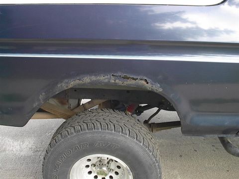 1979 Ford Bronco - This vehicle has extensive rust around the rear wheel well, indicating potential structural issues.