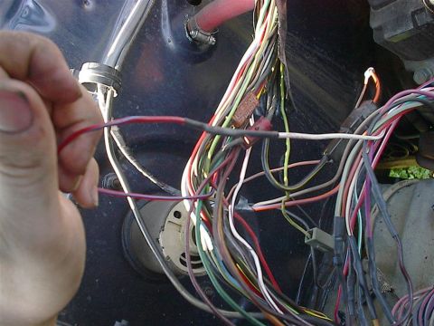 1979 Ford Bronco - A close-up view of a complex vehicle wiring harness with many colorful wires and connectors.