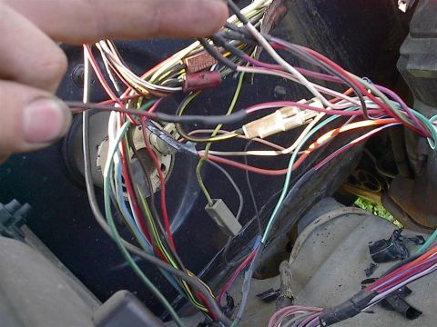 1979 Ford Bronco - A close-up view of a complex vehicle wiring harness, showing numerous wires and connectors.