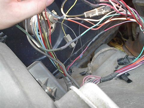 1979 Ford Bronco - A close-up view of a complex vehicle wiring harness, showing numerous colorful wires and connectors.