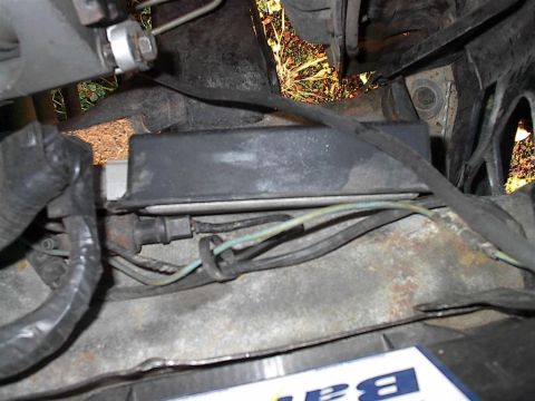 1979 Ford Bronco - Close-up view of engine bay wiring and a black rectangular component, likely part of the electrical system.