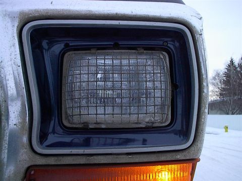 1979 Ford Bronco - Close-up of the headlight and amber turn signal on a 1979 Ford Bronco.