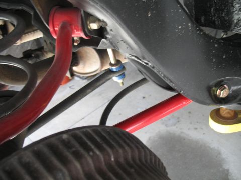 1972 Ford Ranchero - Close-up view of red sway bar and suspension components, with a Supermotors.net watermark visible.