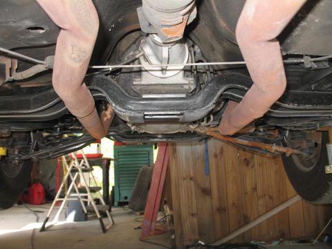 1972 Ford Ranchero - Undercarriage view of a vehicle, focusing on the exhaust and drivetrain components.