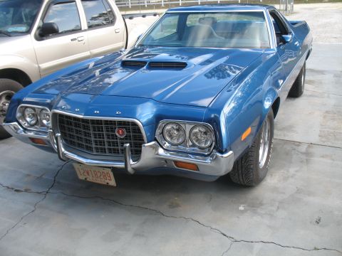 1972 Ford Ranchero - Front 3/4 view of a blue 1972 Ford Ranchero with a scoop on the hood.
