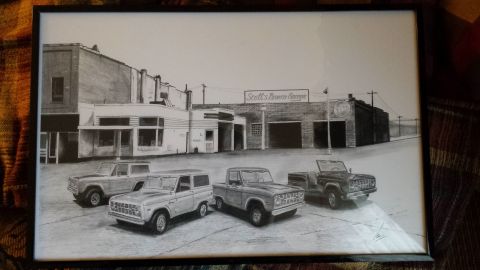 1995 Ford Bronco - This drawing depicts four Ford Broncos parked outside Scott's Bronco Garage, various models and generations.
