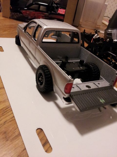 1995 Ford Bronco - Model pickup truck with tailgate open, showing the bed and chassis components.