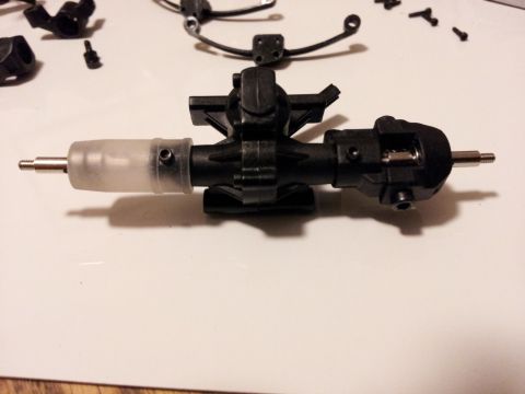1995 Ford Bronco - This is a close-up of a disassembled RC car differential, showing its internal components.