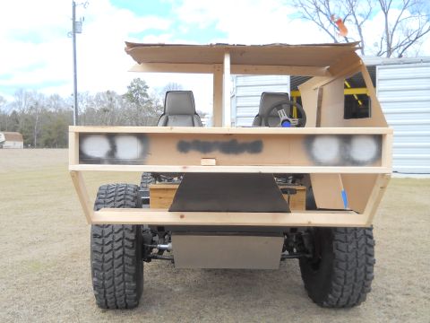 1992 Ford Bronco - This homemade vehicle replica is constructed from wood and cardboard, with seats and a steering wheel visible.