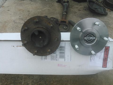 1996 Ford Bronco - 7-lug axleshaft vs my new 5-lug axleshaft. the hub doesn't stick out very far. this doesn't bother me too much but it would have been nice…