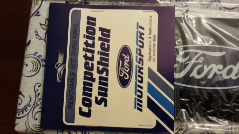 1995 Ford Bronco - Packaging for a Ford Competition Sunshield, with text and graphics visible.