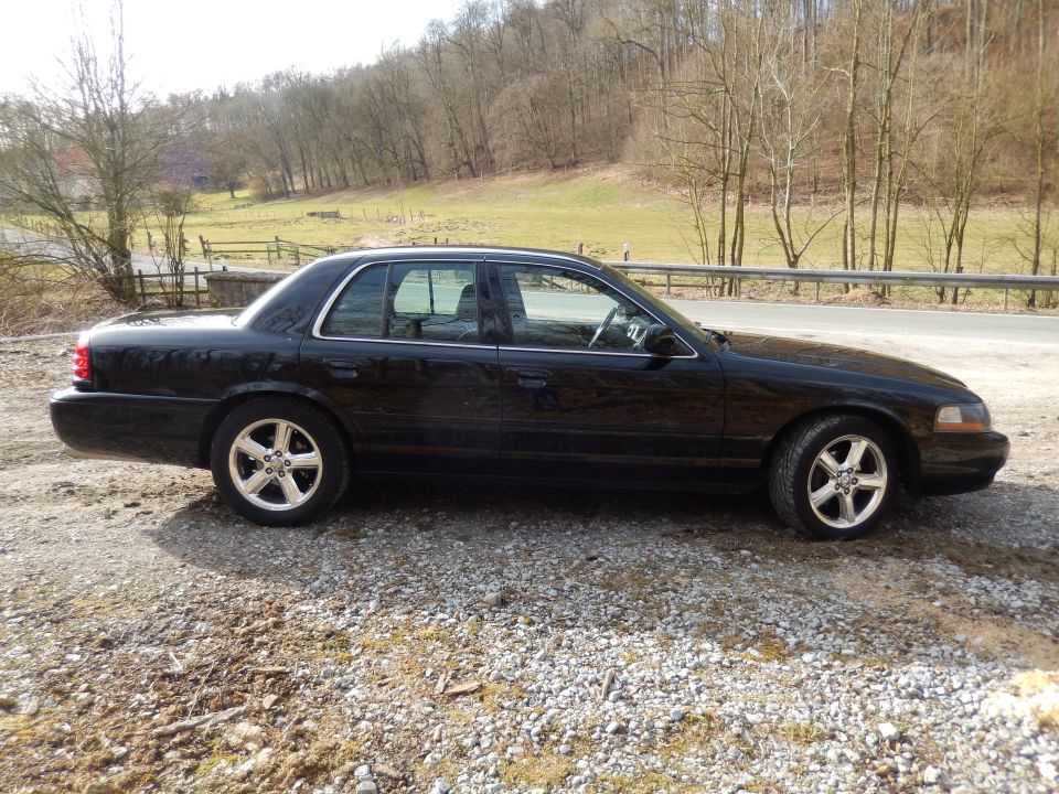 2003 Mercury Marauder parked on gravel roadside