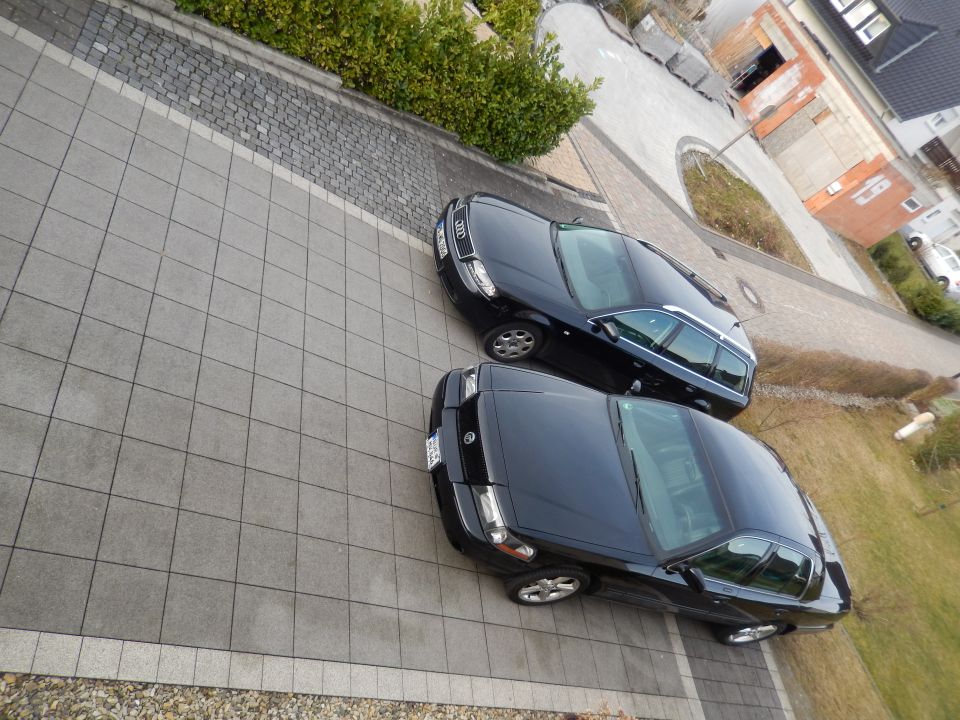 Black 2003 Mercury Marauder parked on paved driveway, front quarter view
