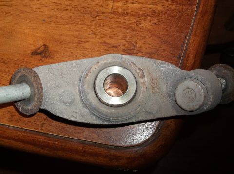 1999 Mercury Grand Marquis - This is a close-up view of a metal automotive part, possibly from an axle, with visible markings including a bolt labeled '10.9'.