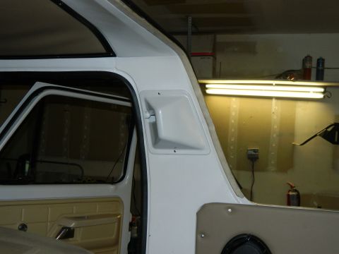 1979 Ford Bronco - Interior view of a 1979 Ford Bronco, focusing on the door panel and pillar trim.
