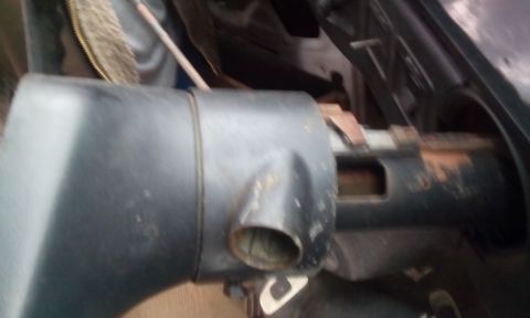 1988 Ford F-150 - Interior view of a vehicle's steering column shroud and surrounding components.