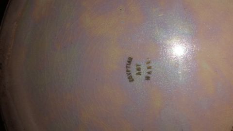 2015 Chevrolet new - A close-up of a ceramic bowl shows stamped text indicating it is Egyptian Art Ware.