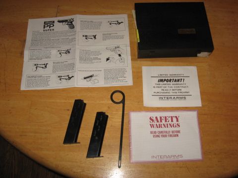1976 Dodge Power Ram - Contents of an Interarms PP Super pistol box, including manual, magazines, and documentation.