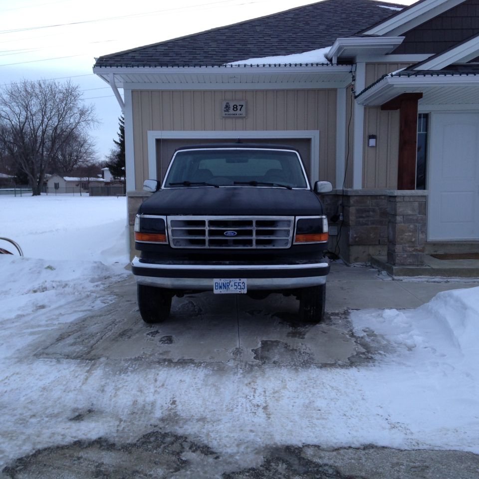 1992 Ford Bronco front view in snow