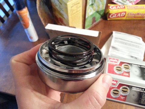 1981 Ford Bronco - A Warn manual locking hub part is shown, with its packaging in the background. The registry label for a 1981 Ford Bronco is incorrect.