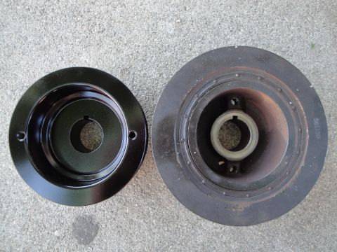 1995 Ford Taurus - Crankshaft pulley and harmonic balancer shown side-by-side. Part number 501130 is visible on the balancer.