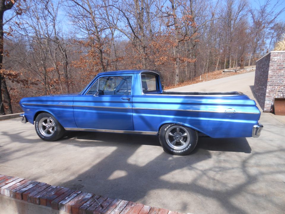Blue 1965 Ford Ranchero pickup truck, side view