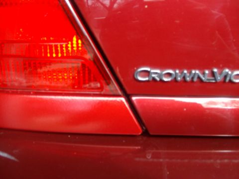 2004 Ford Crown Victoria - Touch up Toreador Red paint.