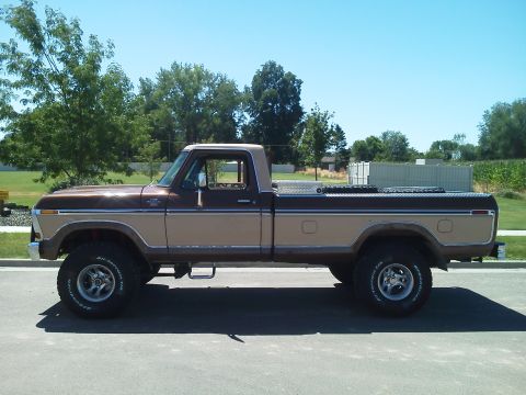 1979 Ford F-150 - This two-tone Ford F-150 pickup truck is shown from the side on a sunny day.