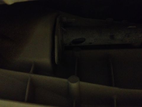 2005 Jeep Wrangler - A dark, indistinct view of a vehicle component, possibly from underneath.