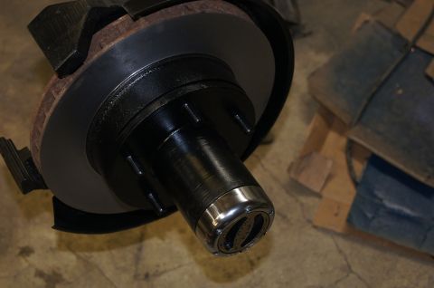 1979 Ford Bronco - A vehicle's brake rotor and hub assembly is shown in a close-up view.