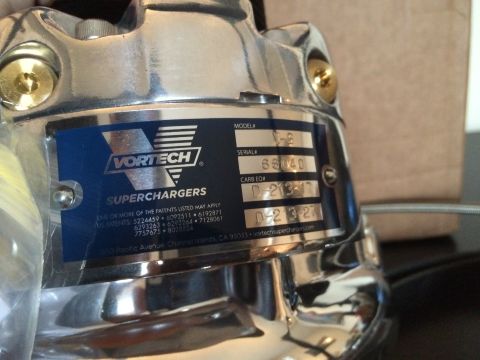 2003 Mercury Marauder - Close-up of a Vortech V-6 supercharger, showing model and serial information.