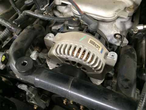 2003 Mercury Marauder - Engine bay detail showing the alternator and surrounding components.
