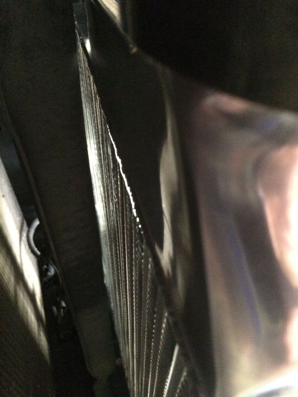 Close-up of radiator fins with some damage visible