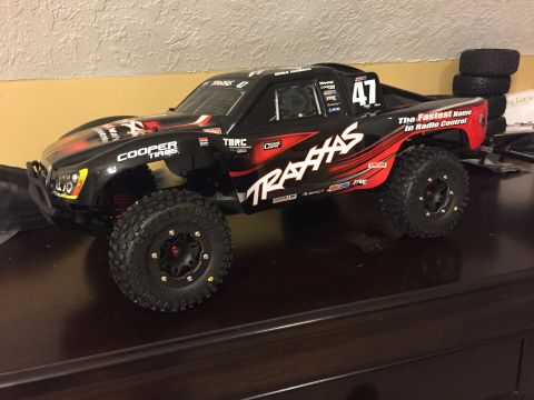 2014 Dodge 1500 - This remote control short course truck features "Traxxas" branding and "Cooper Tires" decals.